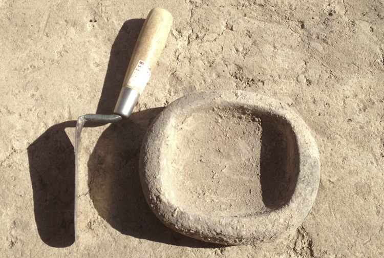 Stone bowl on the floor of a pithouse dug by Desert Archaeology at the Paseo site, Tucson, Arizona