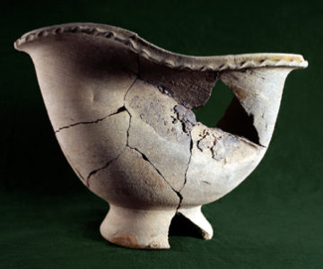 Heat-warped ceramic bowl from historic kiln excavated by Desert Archaeology in Phoenix