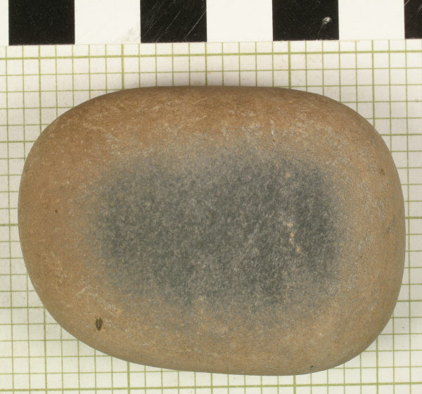 Ground stone used to make disk beads, analyzed by Desert Archaeology