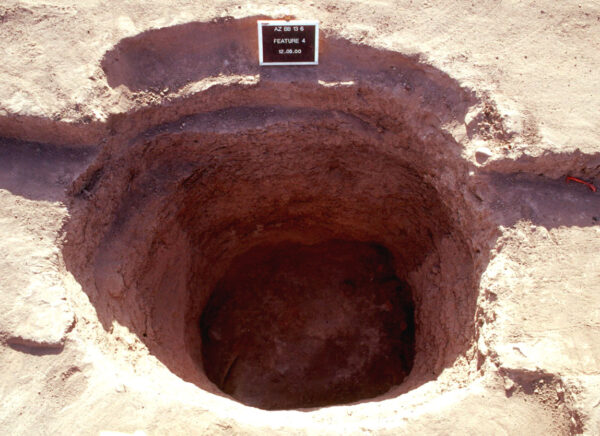 The upper portion of Feature 4, before stripping took place to the five-foot level. It's a basic round hole in the ground.